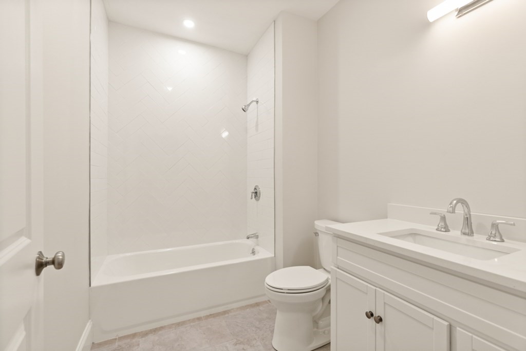 21 Vera Road Middleton, MA 01949 - Photo 25 of 41 a bathroom with a sink a toilet and shower