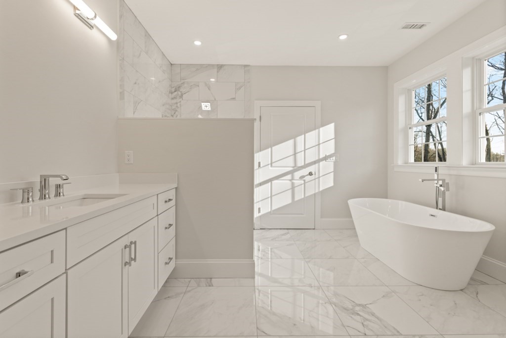 21 Vera Road Middleton, MA 01949 - Photo 27 of 41 a bathroom with a sink and a bathtub