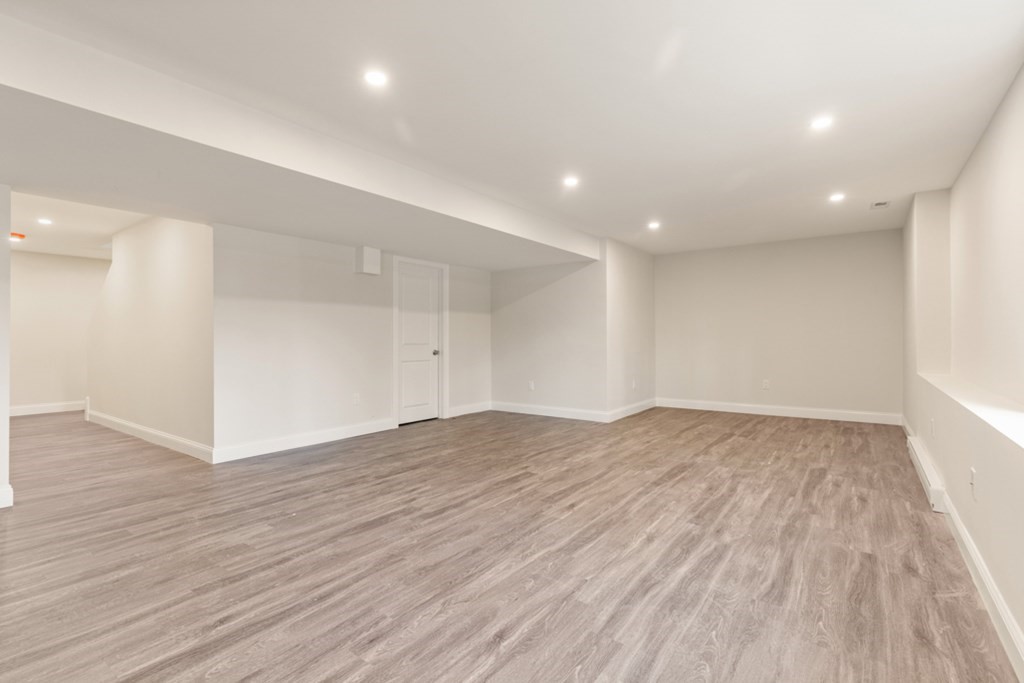 21 Vera Road Middleton, MA 01949 - Photo 31 of 41 a view of empty room with wooden floor