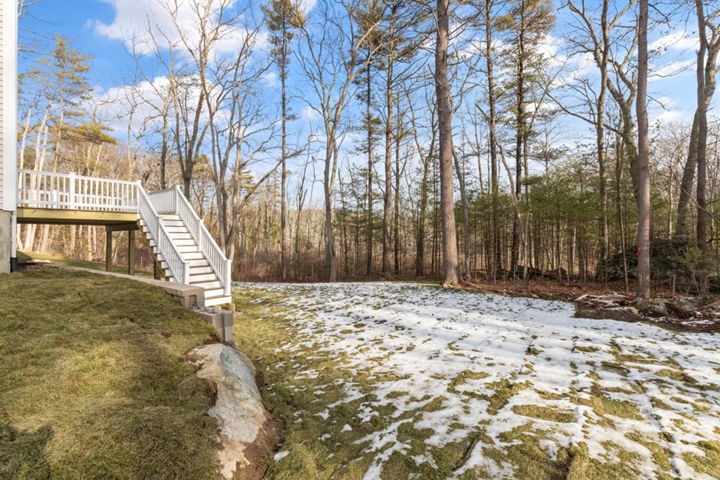 21 Vera Road Middleton, MA 01949 - Photo 33 of 41 a backyard of a house with large trees
