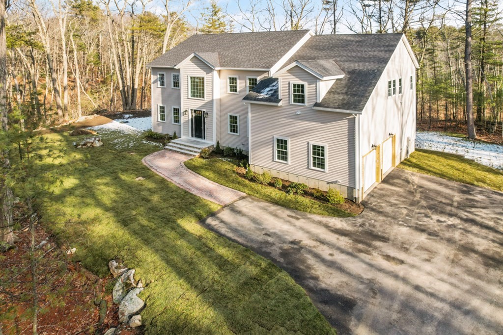 21 Vera Road Middleton, MA 01949 - Photo 36 of 41 a view of a house with a yard