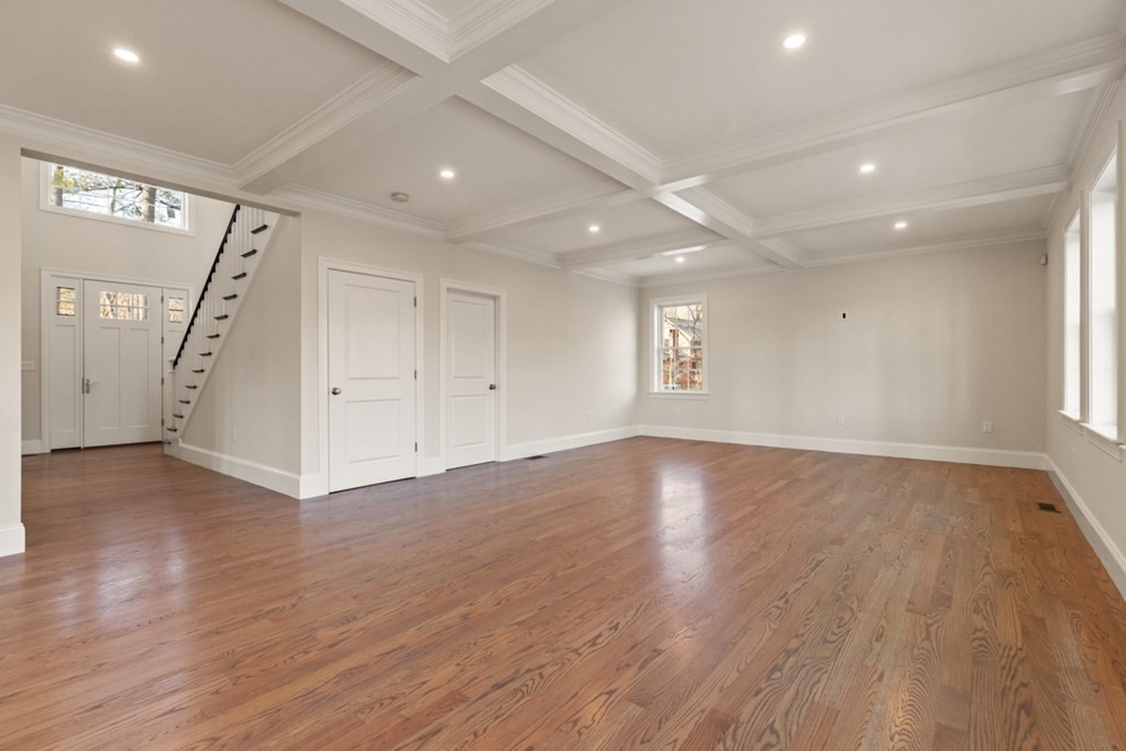 21 Vera Road Middleton, MA 01949 - Photo 9 of 41 a view of an empty room with wooden floor and a window