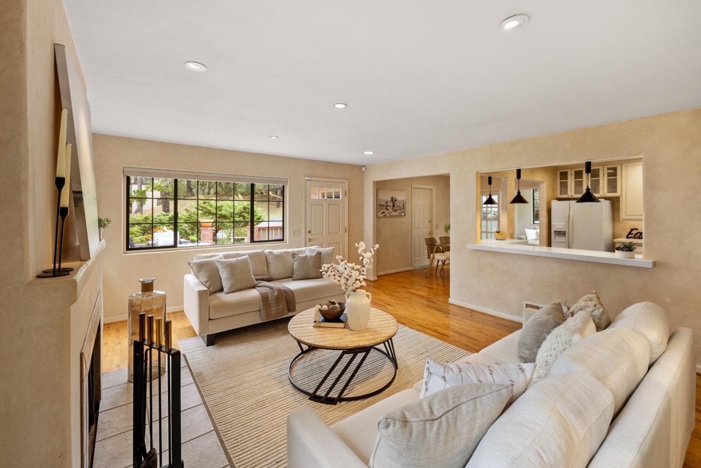 777 Parcel Street Monterey, CA 93940 - Photo 5 of 21 a living room with furniture and a large window