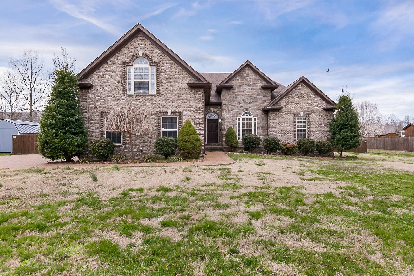 1008 Bradshaw Road Lebanon, TN 37087 - Photo 1 of 21 a front view of a house with a yard