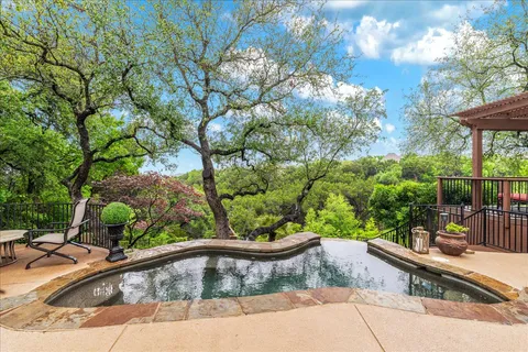a view of a backyard of a house