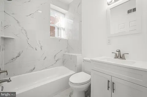 a view of a room that has a window