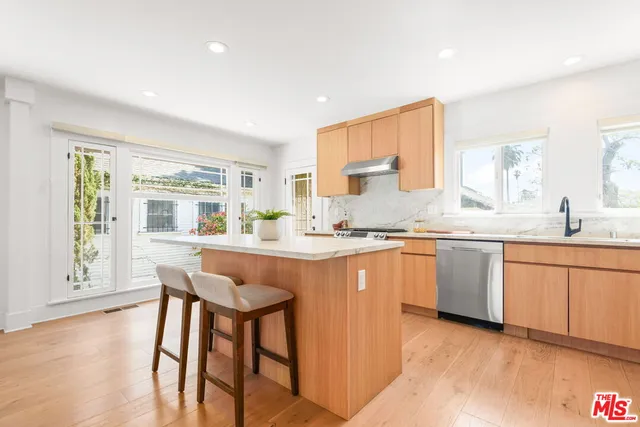 a view of a livingroom with furniture window and outside view
