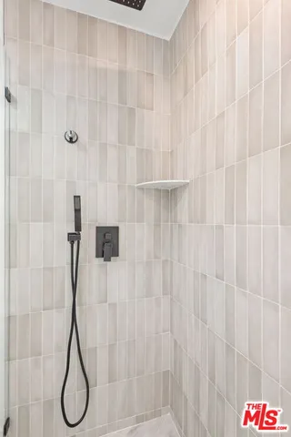 a view of a chairs and table in patio