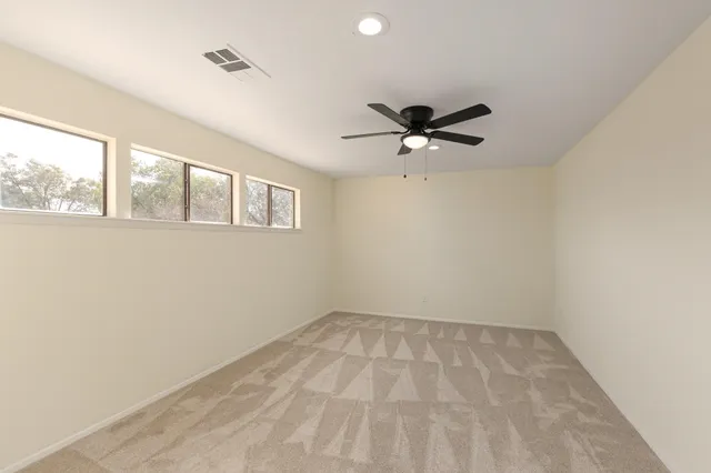 a house view with a backyard space