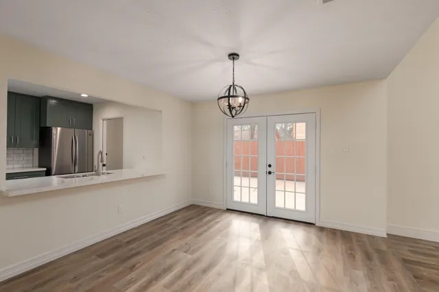 a view of empty room with windows