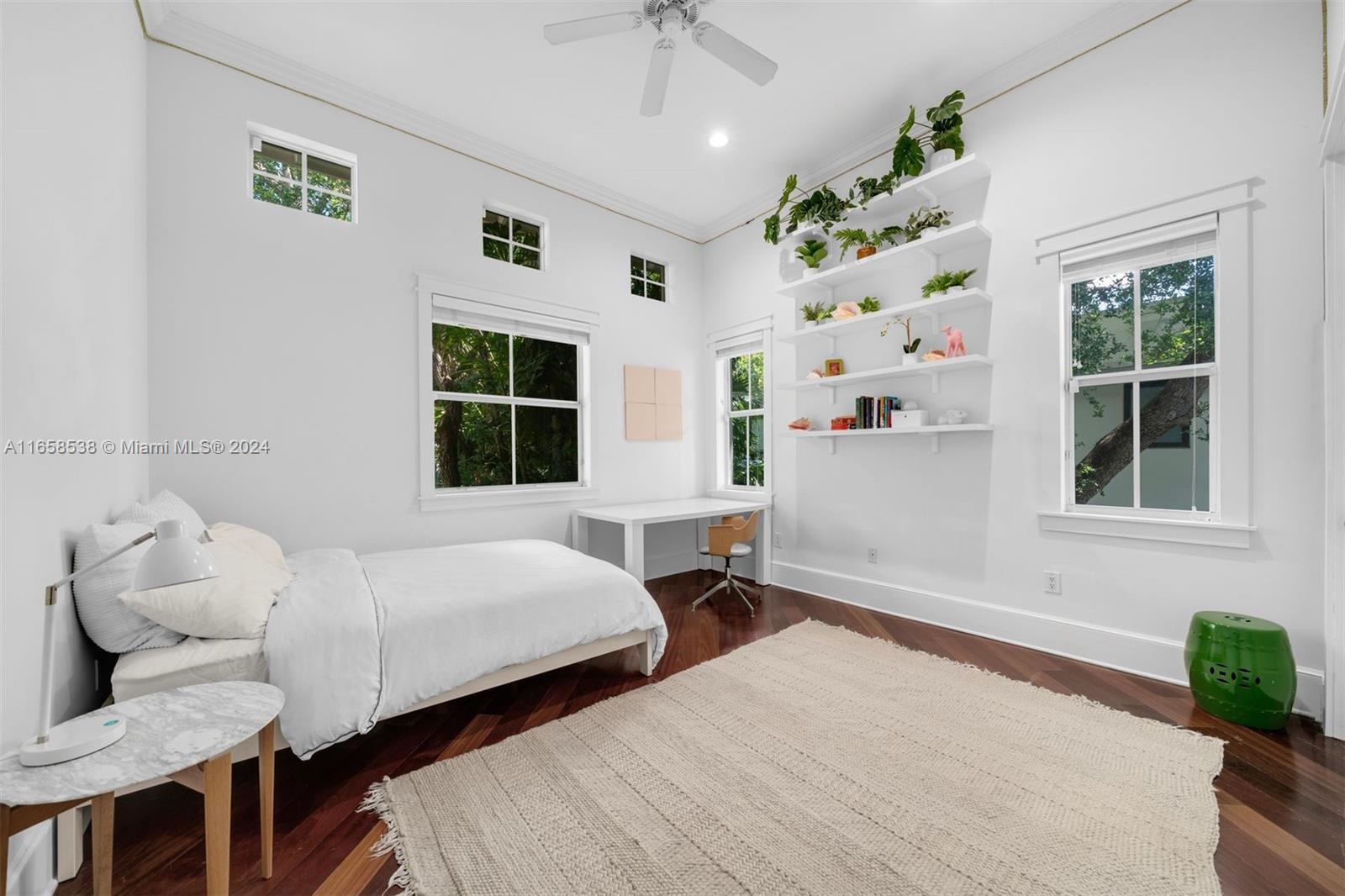 4050 Battersea Road Coconut Grove, FL 33133 - Photo 19 of 40 a bedroom with a bed and a window