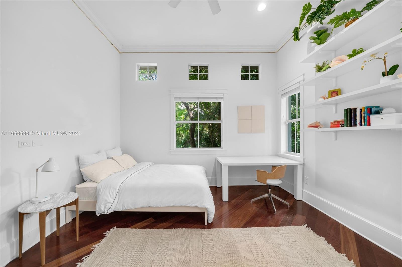 4050 Battersea Road Coconut Grove, FL 33133 - Photo 20 of 40 a bedroom with furniture and a window