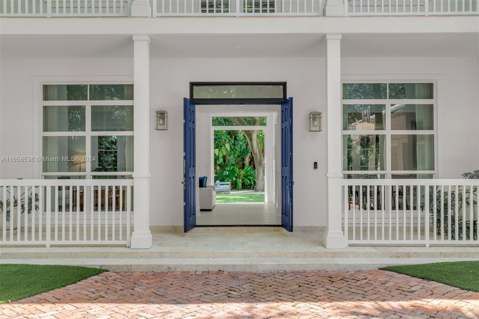4050 Battersea Road Coconut Grove, FL 33133 - Photo 3 of 40 a view of a house with a window