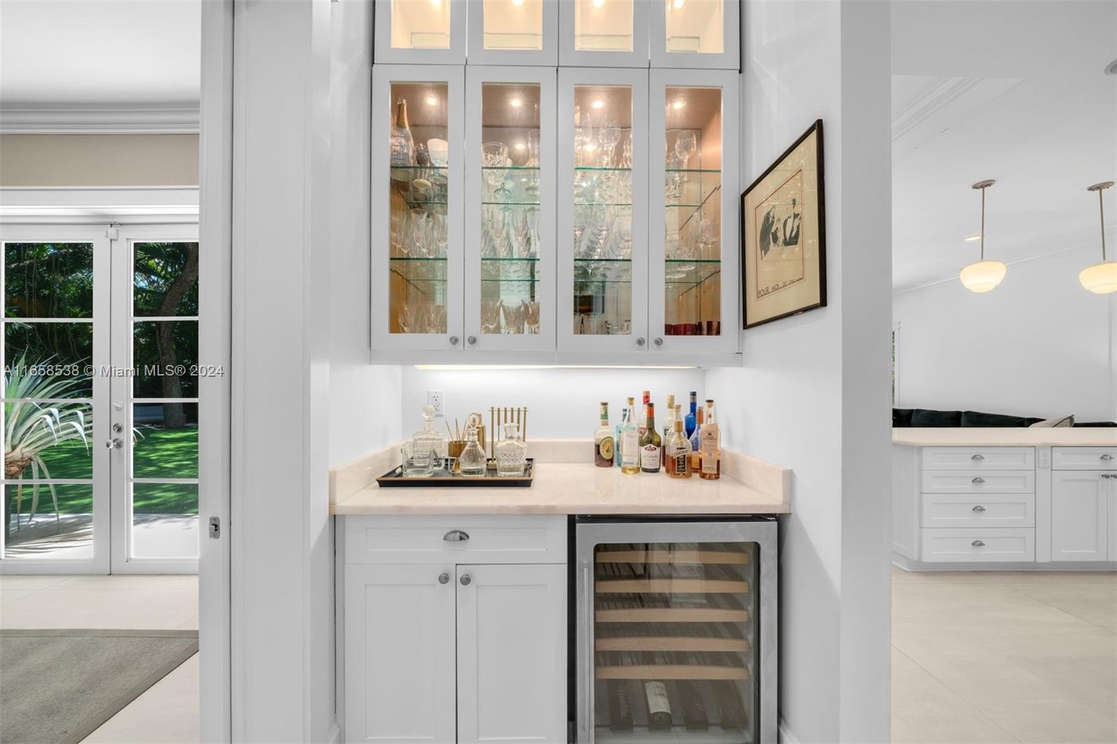 4050 Battersea Road Coconut Grove, FL 33133 - Photo 8 of 40 a bathroom with a sink vanity and a window