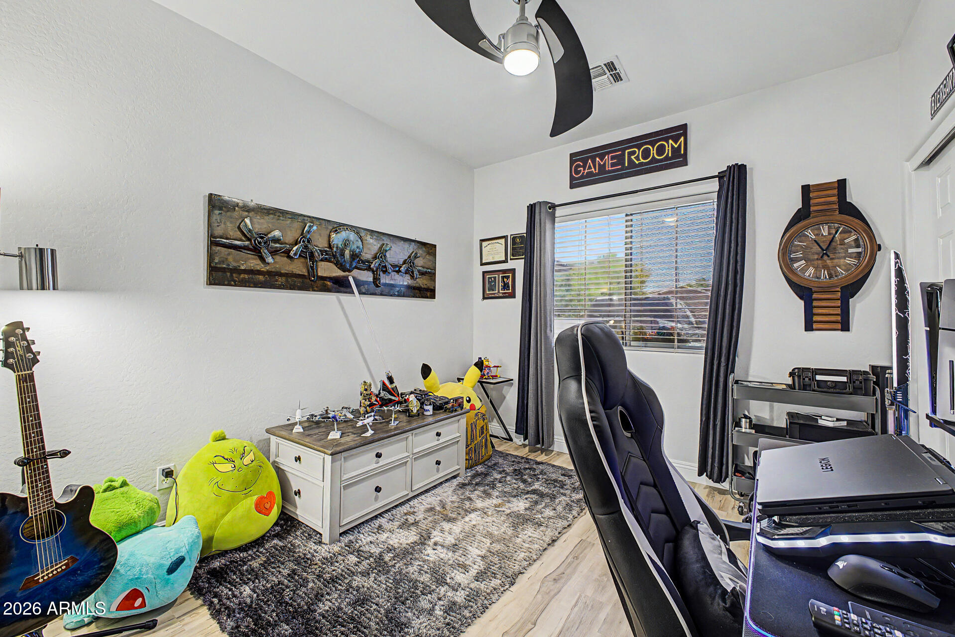 4924 West Harwell Road Laveen, AZ 85339 - Photo 21 of 27 a view of a livingroom with furniture and a rug