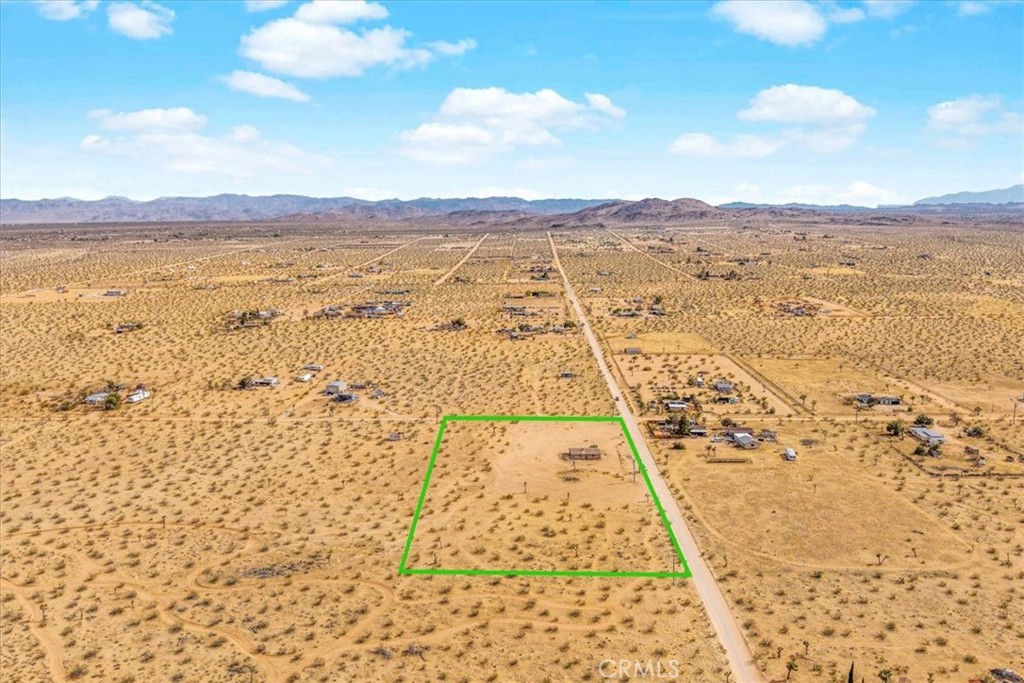 59724 Stearman Road Landers, CA 92285 - Photo 18 of 38 a view of an outdoor space and mountain view