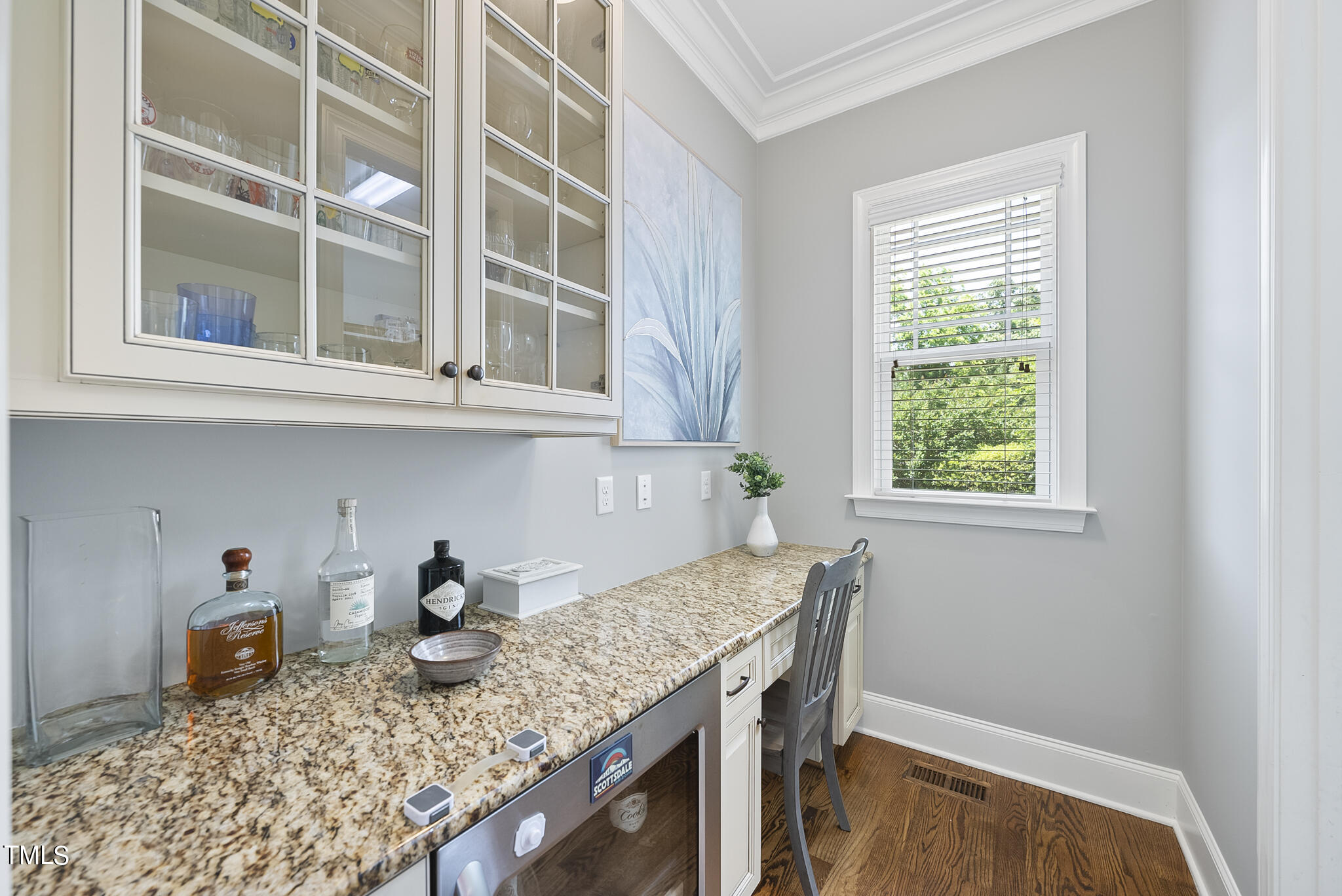 5320 Pomfret Point Raleigh, NC 27612 - Photo 17 of 52 a kitchen with stainless steel appliances granite countertop a sink window and cabinets