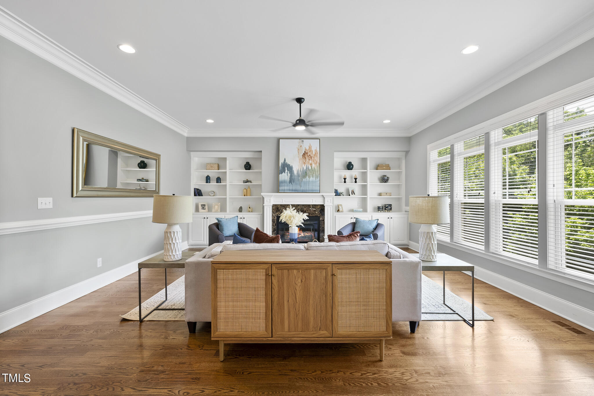5320 Pomfret Point Raleigh, NC 27612 - Photo 18 of 52 a living room with fireplace furniture and a large window