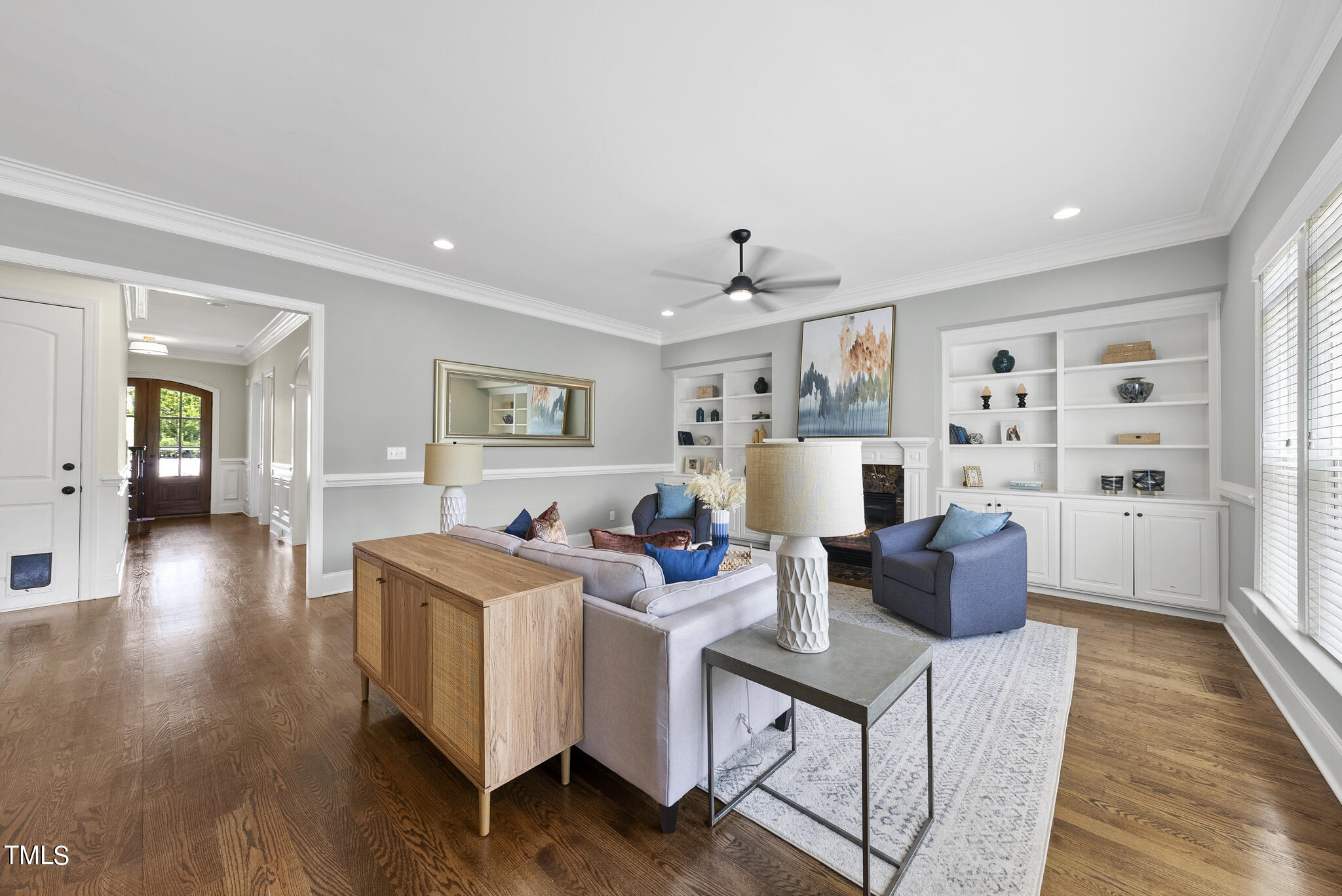 5320 Pomfret Point Raleigh, NC 27612 - Photo 20 of 52 a living room with furniture and wooden floor