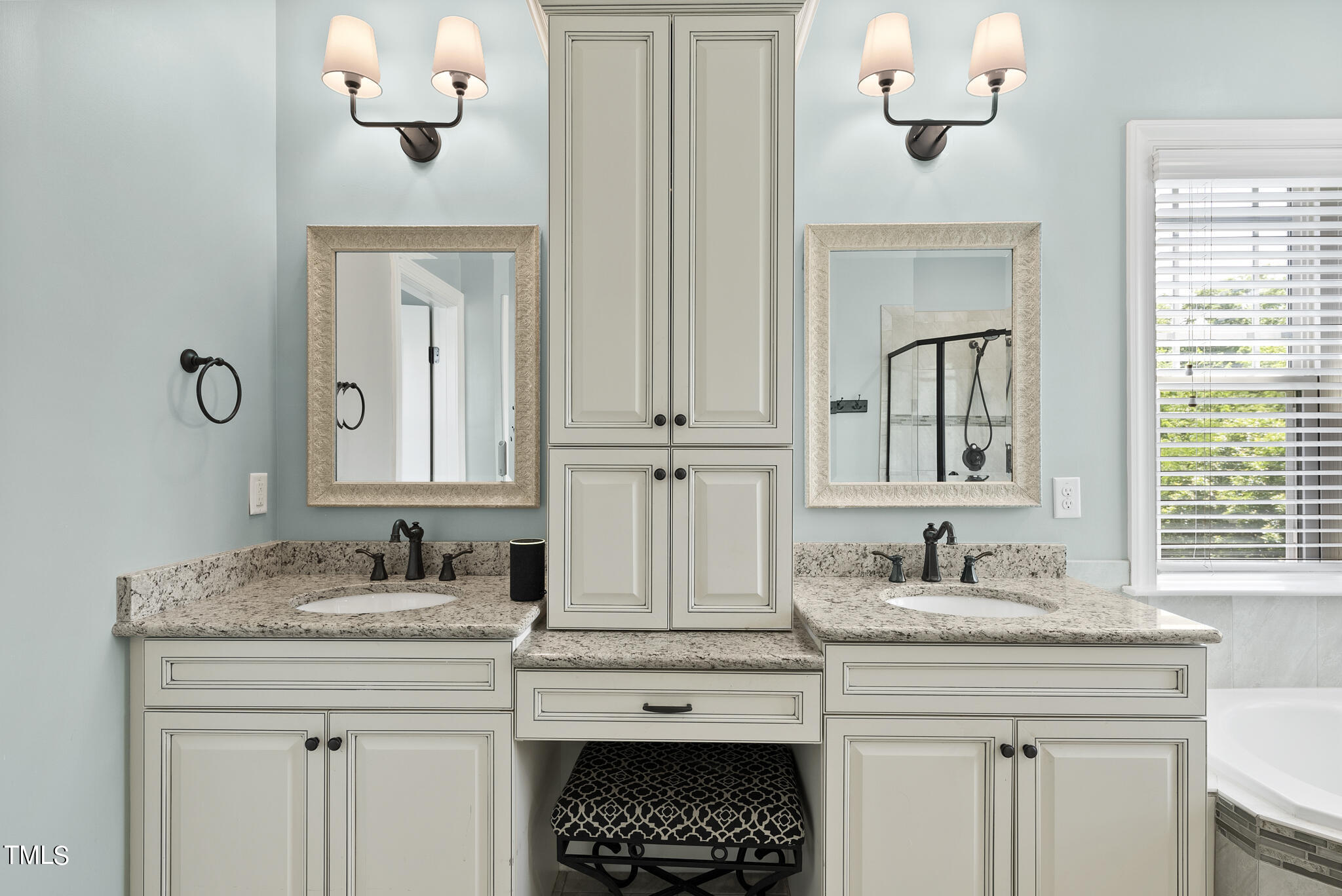 5320 Pomfret Point Raleigh, NC 27612 - Photo 28 of 52 a bathroom with a sink and a mirror