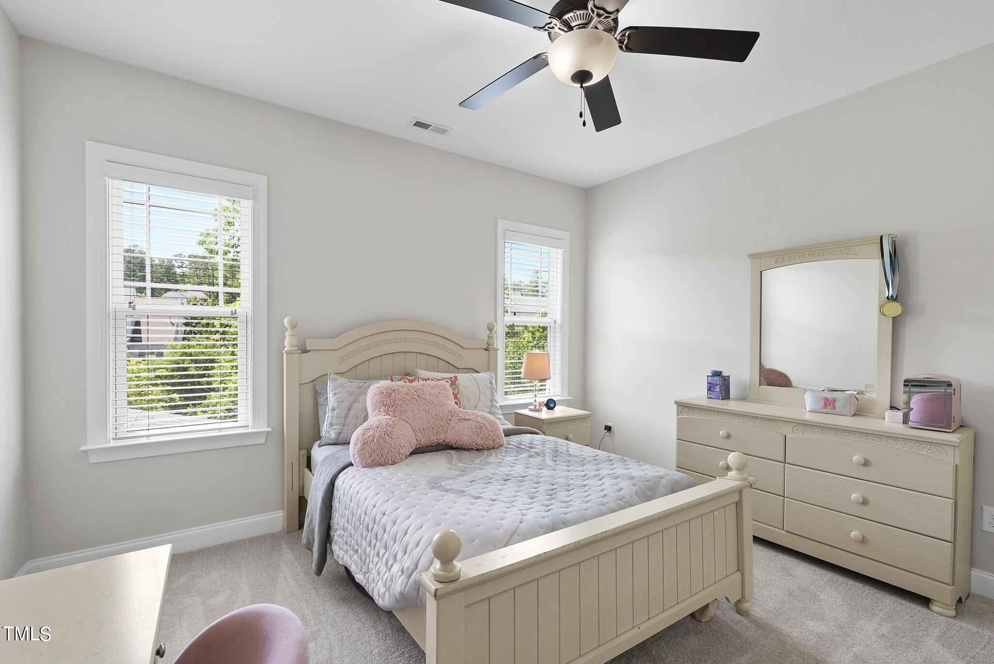 5320 Pomfret Point Raleigh, NC 27612 - Photo 31 of 52 a bedroom with a large bed and a window