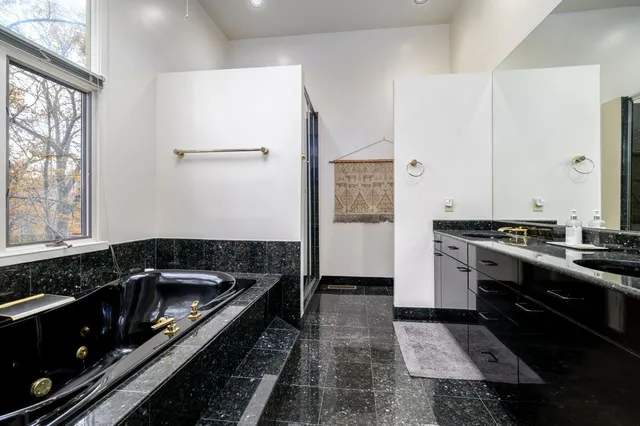 a kitchen that has a sink and a stove