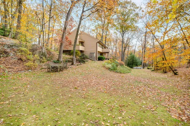 a view of a yard in front of a house