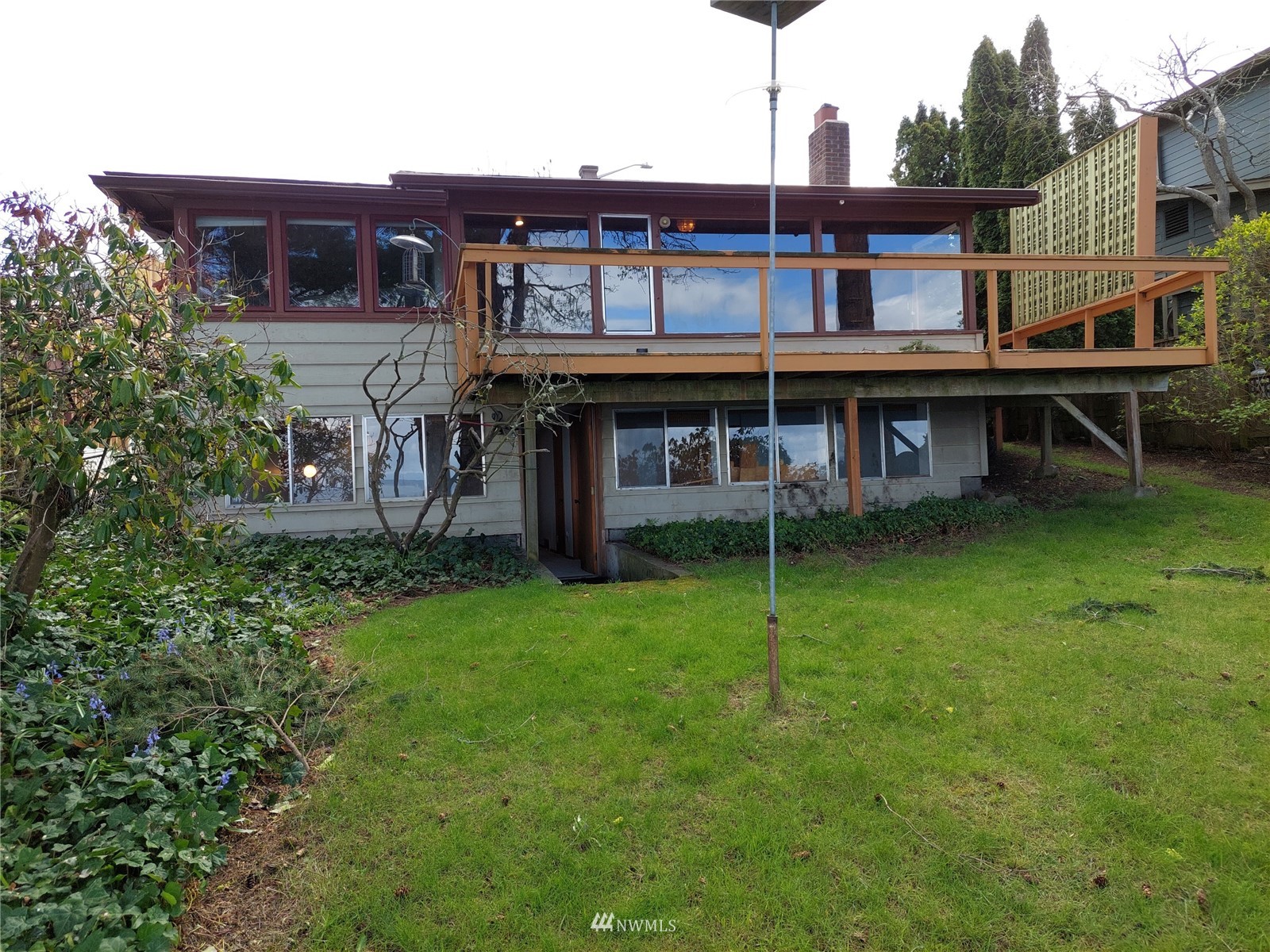9205 Olympic View Drive Edmonds, WA 98020 - Photo 11 of 25 a view of a house with a backyard
