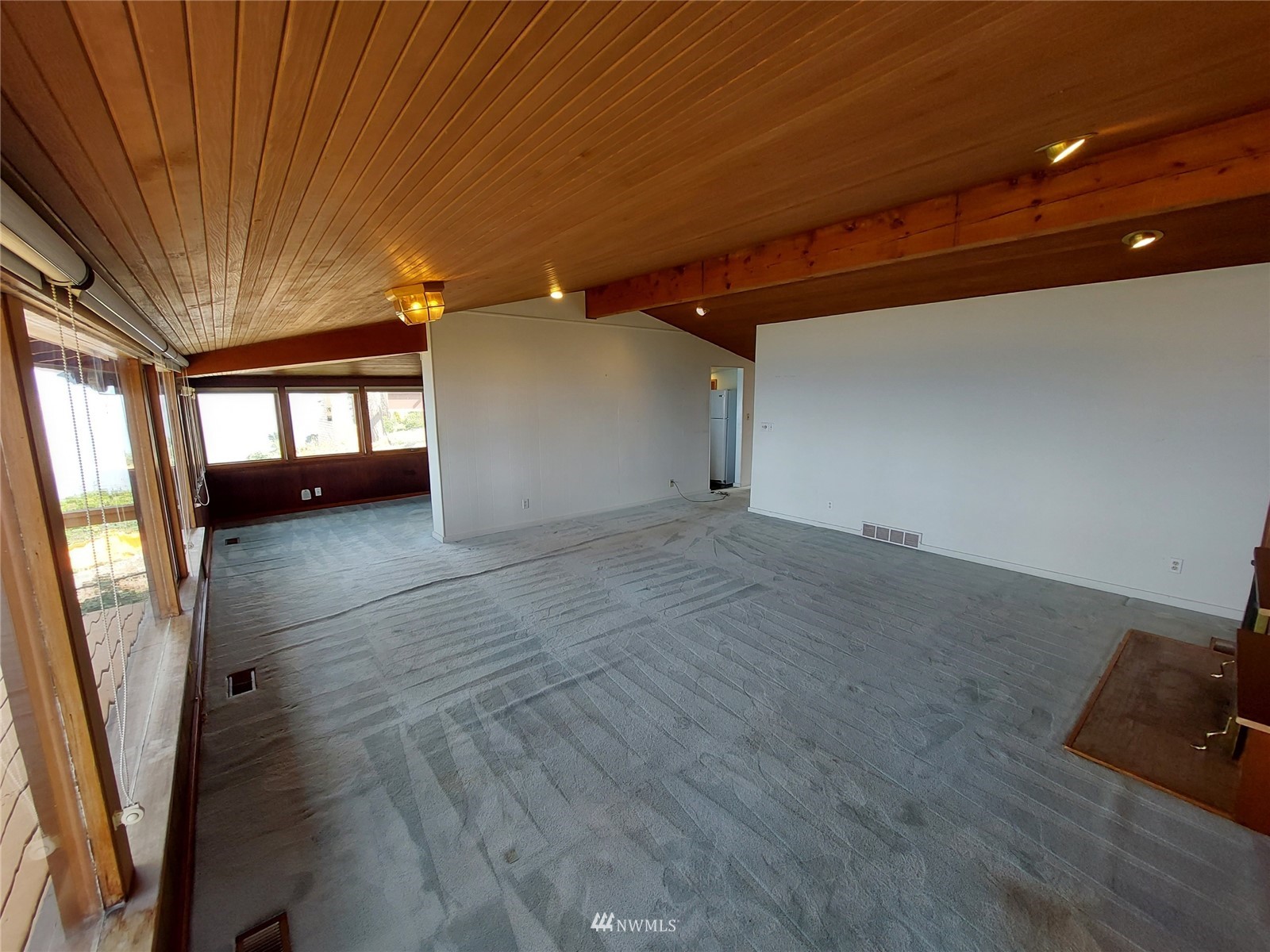 9205 Olympic View Drive Edmonds, WA 98020 - Photo 16 of 25 wooden floor in an empty room with a window