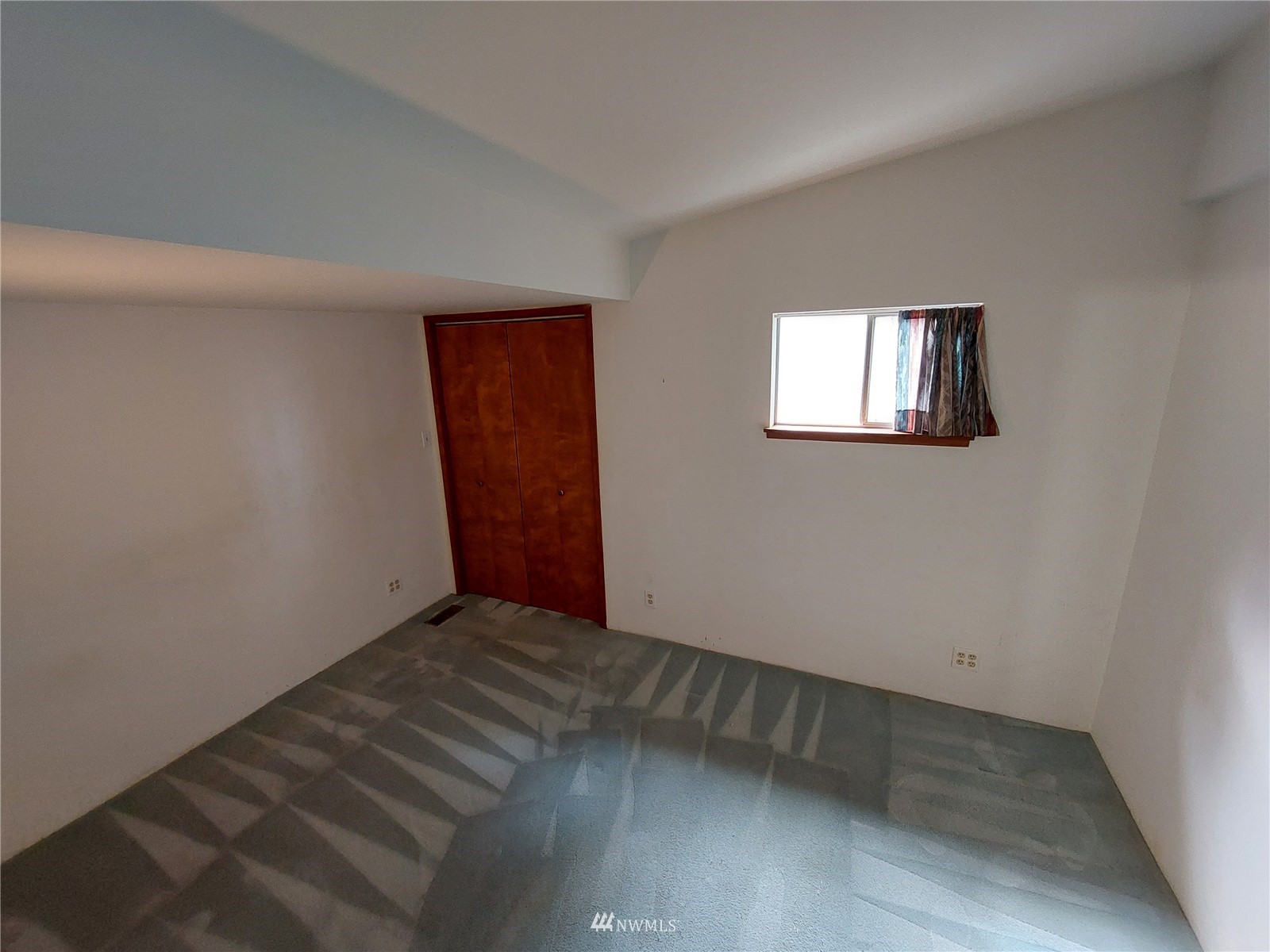 9205 Olympic View Drive Edmonds, WA 98020 - Photo 18 of 25 an empty room with windows