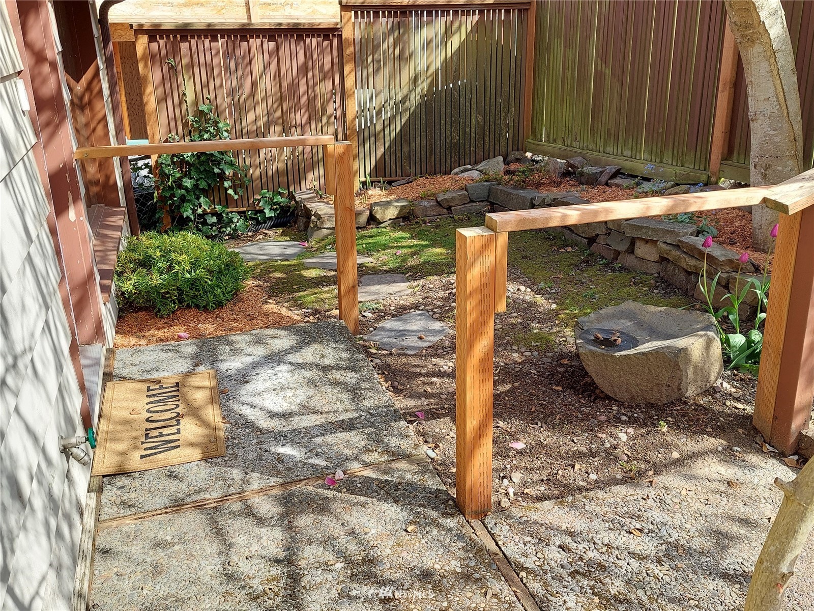 9205 Olympic View Drive Edmonds, WA 98020 - Photo 2 of 25 a view of a backyard of the house