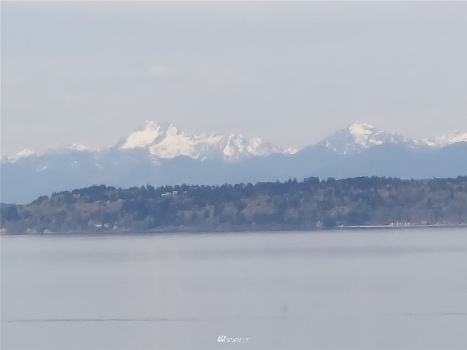 9205 Olympic View Drive Edmonds, WA 98020 - Photo 8 of 25 a view of a lake and a mountain