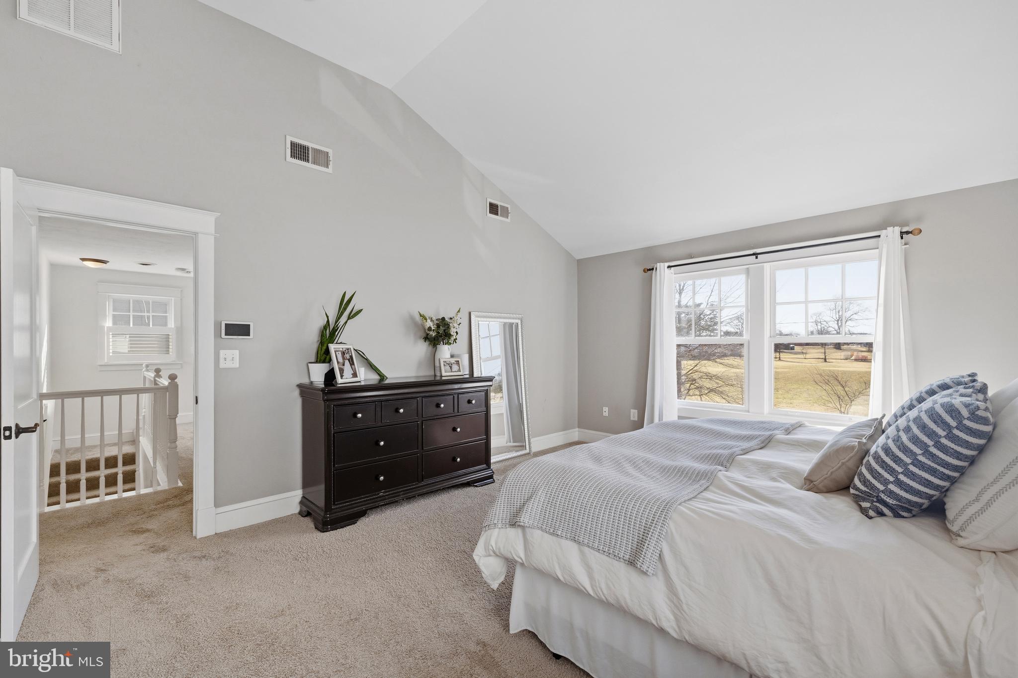 304 Locust Avenue Annapolis, MD 21401 - Photo 15 of 58 a bedroom with a bed and a dresser