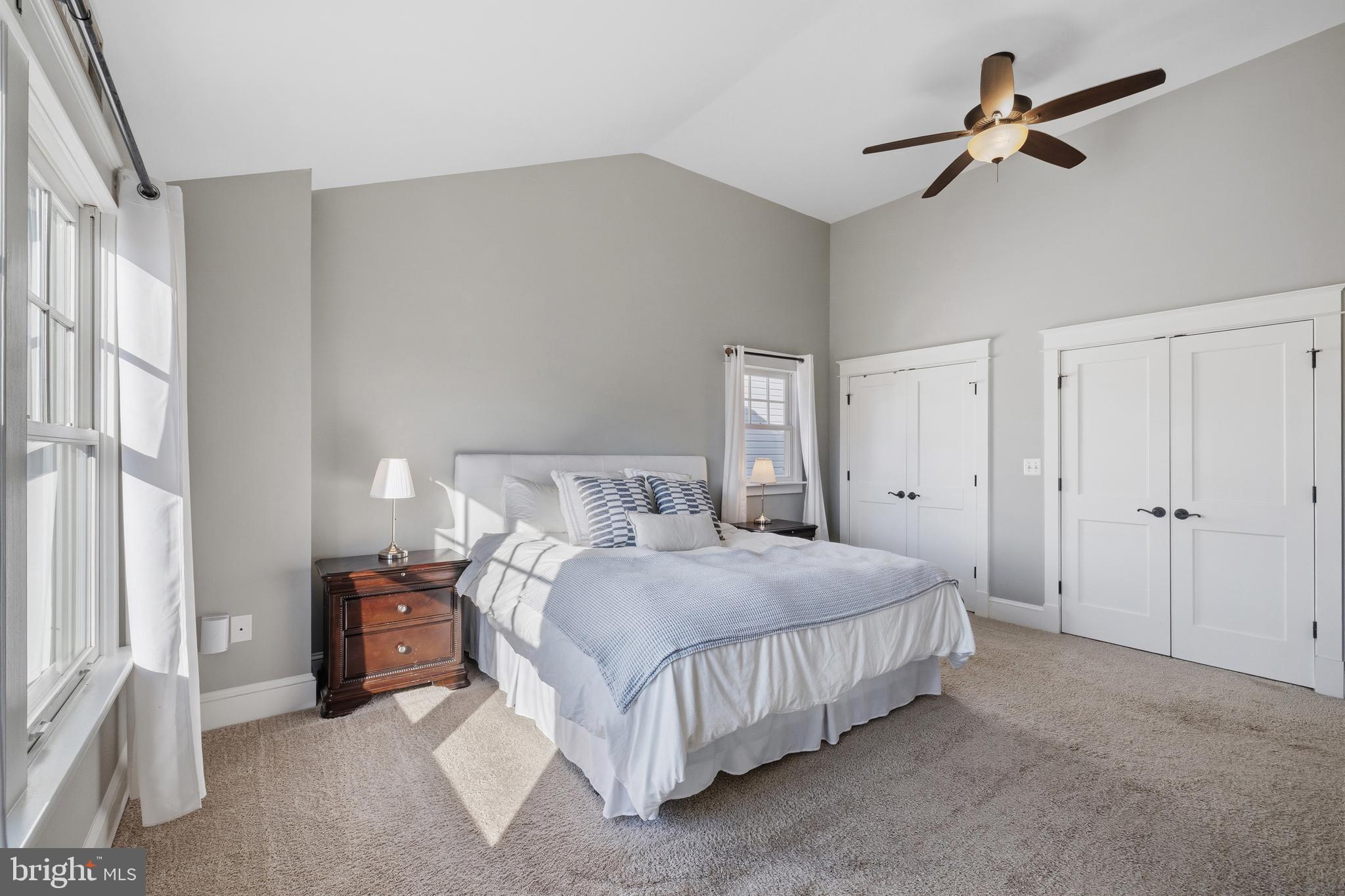 304 Locust Avenue Annapolis, MD 21401 - Photo 16 of 58 a bedroom with a bed chandelier and a window