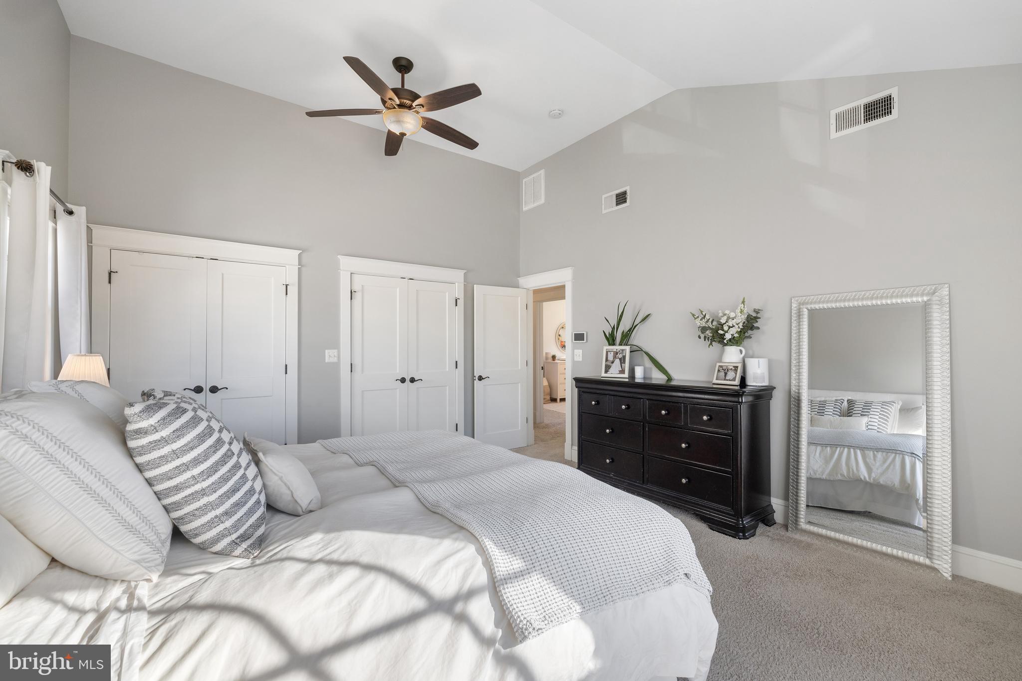 304 Locust Avenue Annapolis, MD 21401 - Photo 17 of 58 a bedroom with a bed and a ceiling fan