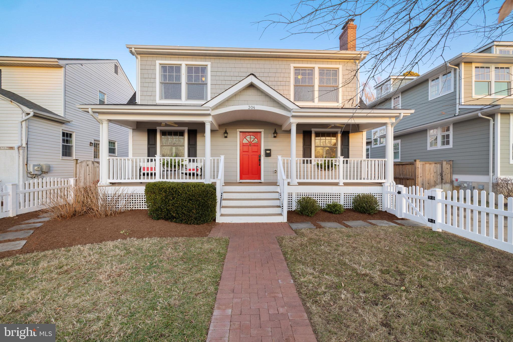 304 Locust Avenue Annapolis, MD 21401 - Photo 52 of 58 a front view of a house with a yard