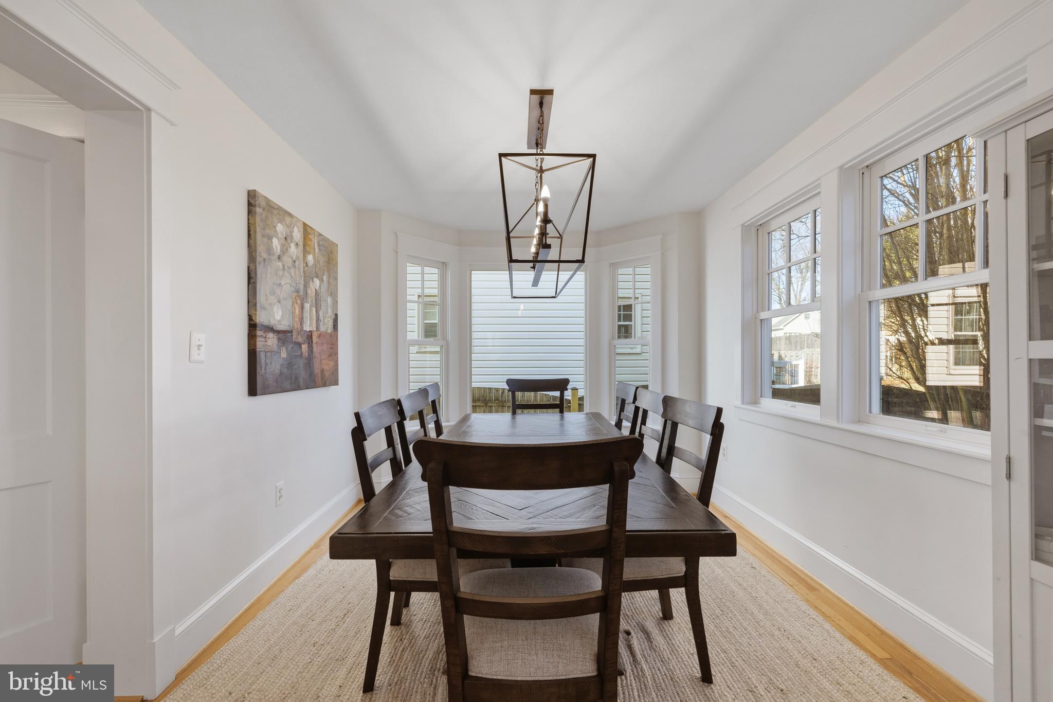 304 Locust Avenue Annapolis, MD 21401 - Photo 9 of 58 a dining room with furniture window and wooden floor