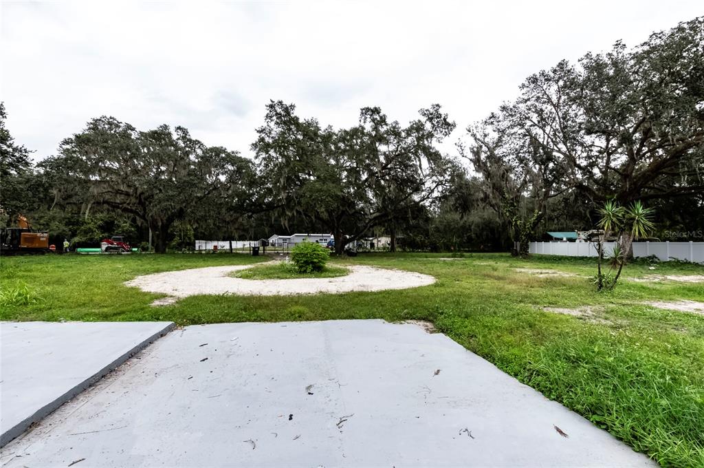 1550 South Tanner Road Orlando, FL 32833 - Photo 6 of 9 a view of a park with large trees