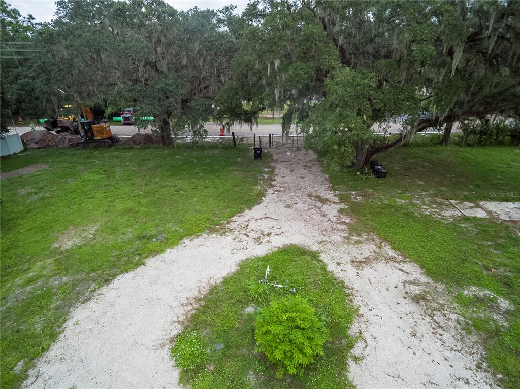 1550 South Tanner Road Orlando, FL 32833 - Photo 7 of 9 a view of a park with large trees