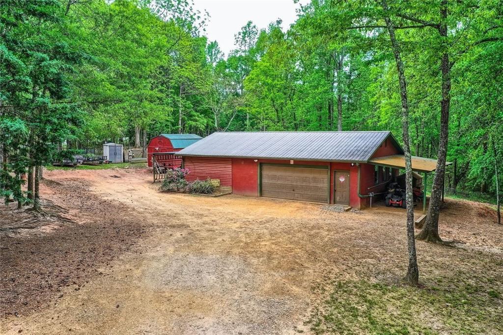 5419 Tyree Road Winston, GA 30187 - Photo 11 of 77 a view of a house with a yard