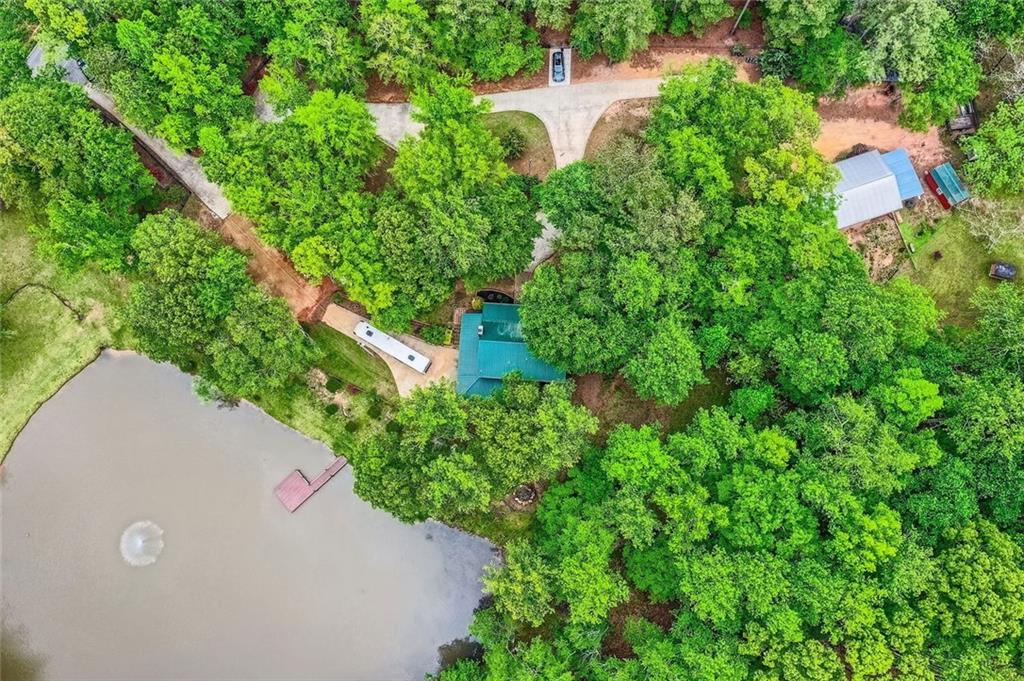 5419 Tyree Road Winston, GA 30187 - Photo 14 of 77 view of a house with a yard and sitting area