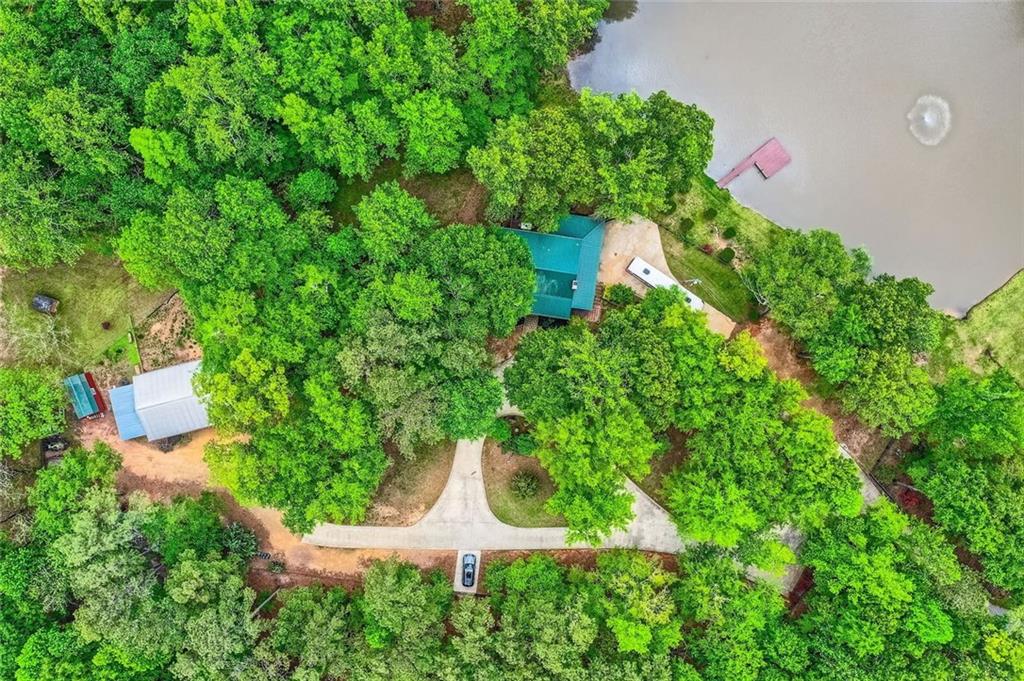 5419 Tyree Road Winston, GA 30187 - Photo 16 of 77 an aerial view of a house with a yard and outdoor seating