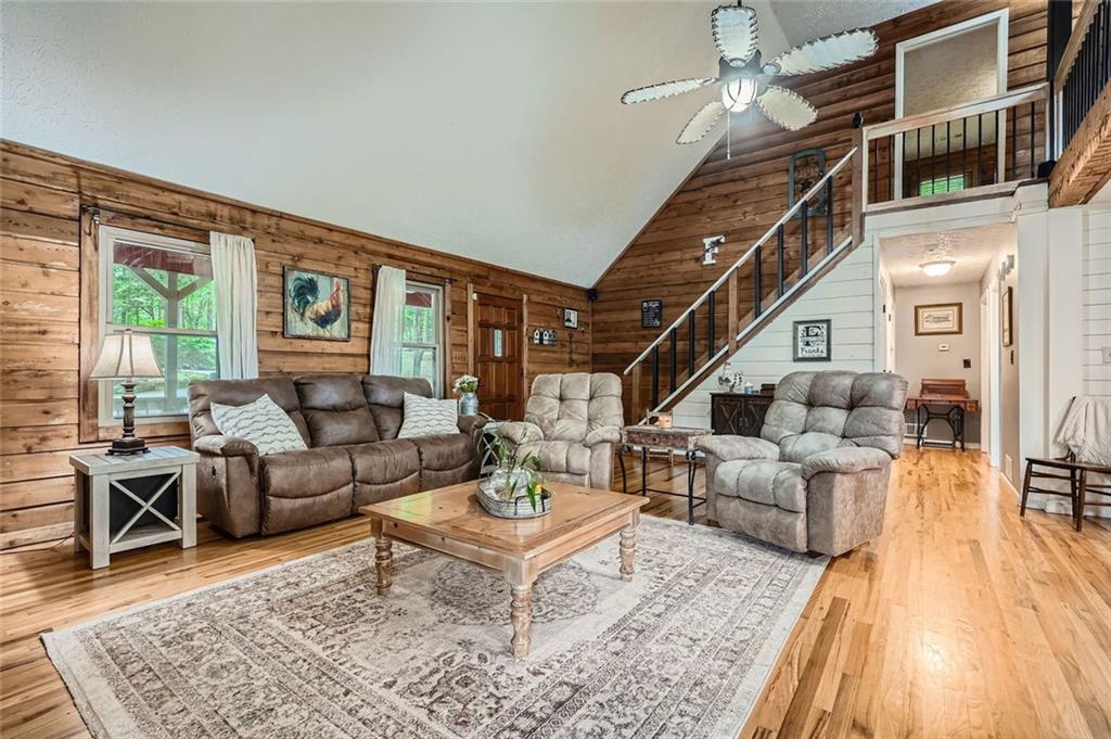 5419 Tyree Road Winston, GA 30187 - Photo 20 of 77 a living room with fireplace furniture and a rug