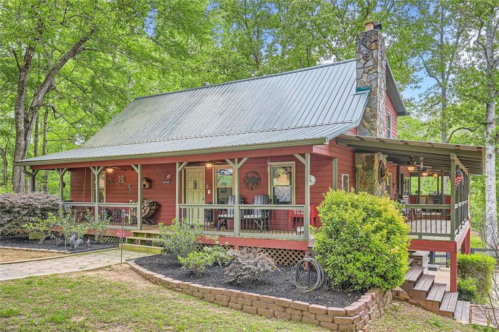 5419 Tyree Road Winston, GA 30187 - Photo 2 of 77 front view of a house with a garden
