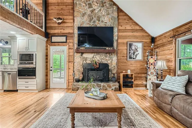 a kitchen with stainless steel appliances granite countertop a stove and a refrigerator