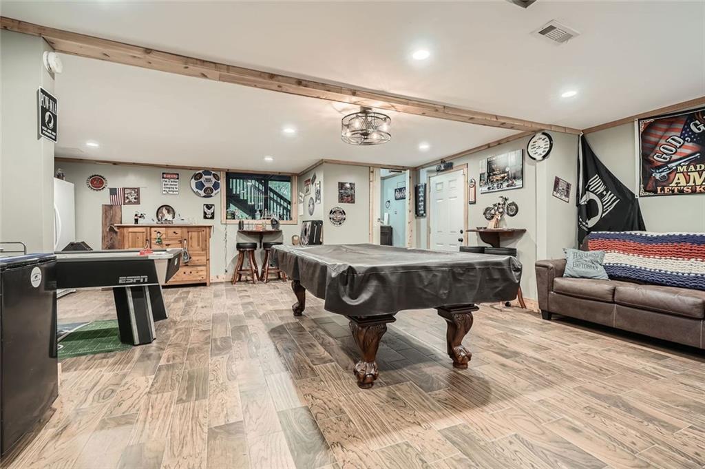 5419 Tyree Road Winston, GA 30187 - Photo 39 of 77 a living room with furniture and wooden floor