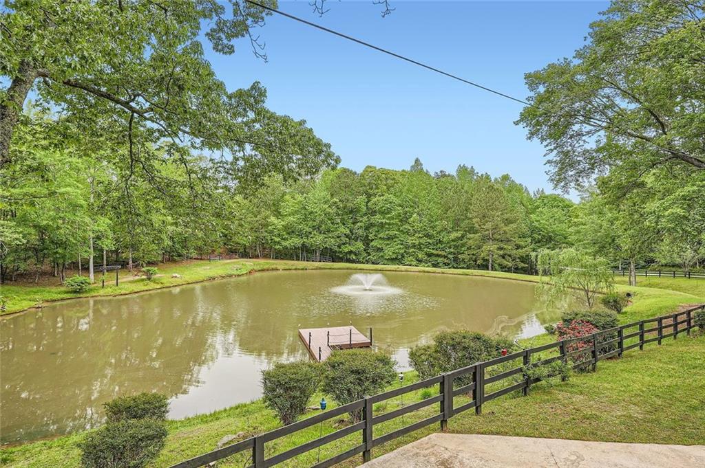 5419 Tyree Road Winston, GA 30187 - Photo 48 of 77 a view of a lake with a mountain