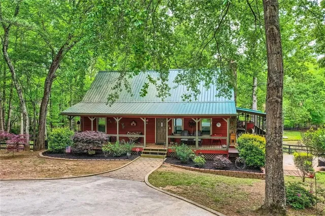 a house with trees in front of it