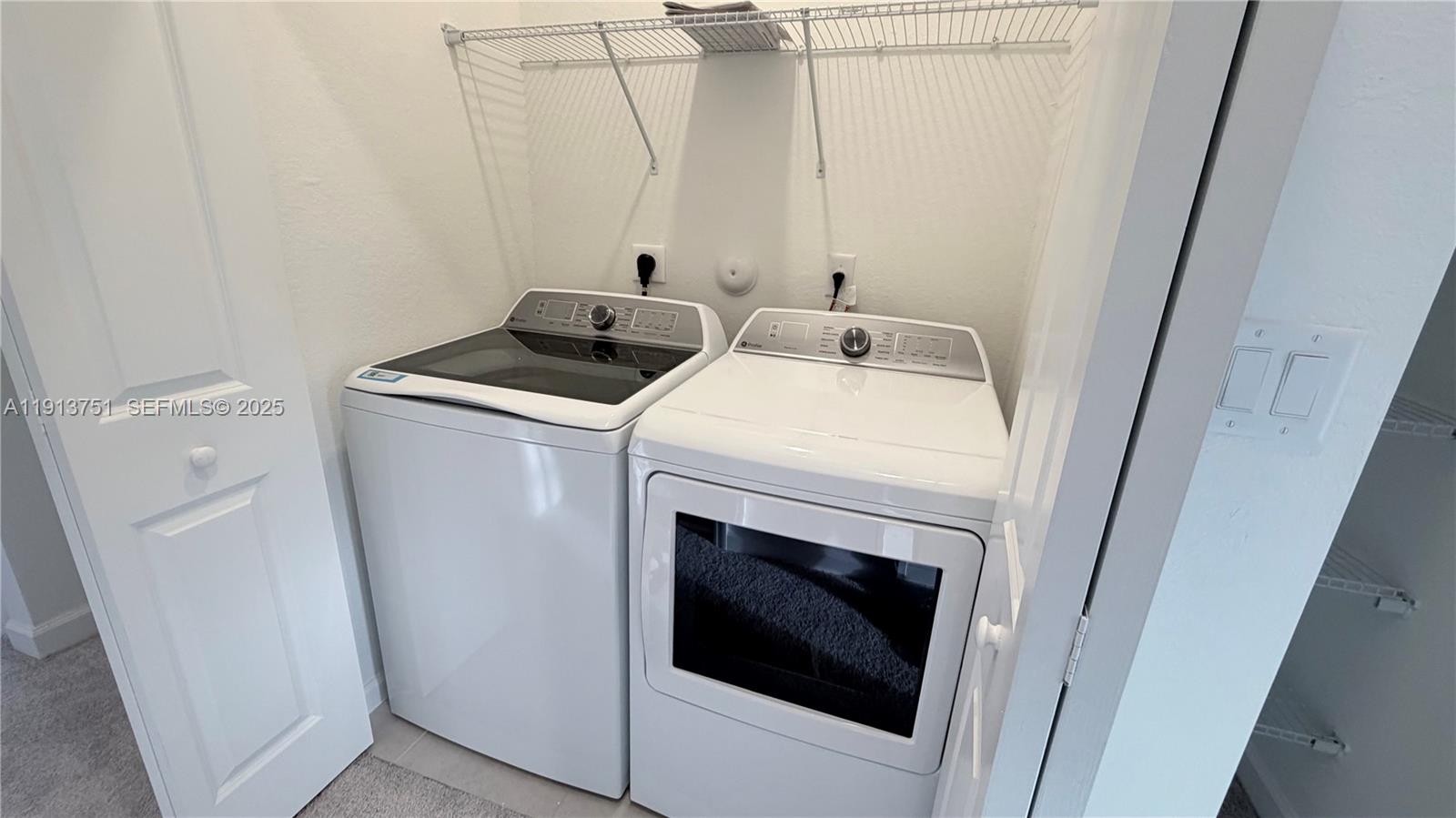 23250 Southwest 133rd Court Homestead, FL 33032 - Photo 18 of 31 a utility room with dryer and washer