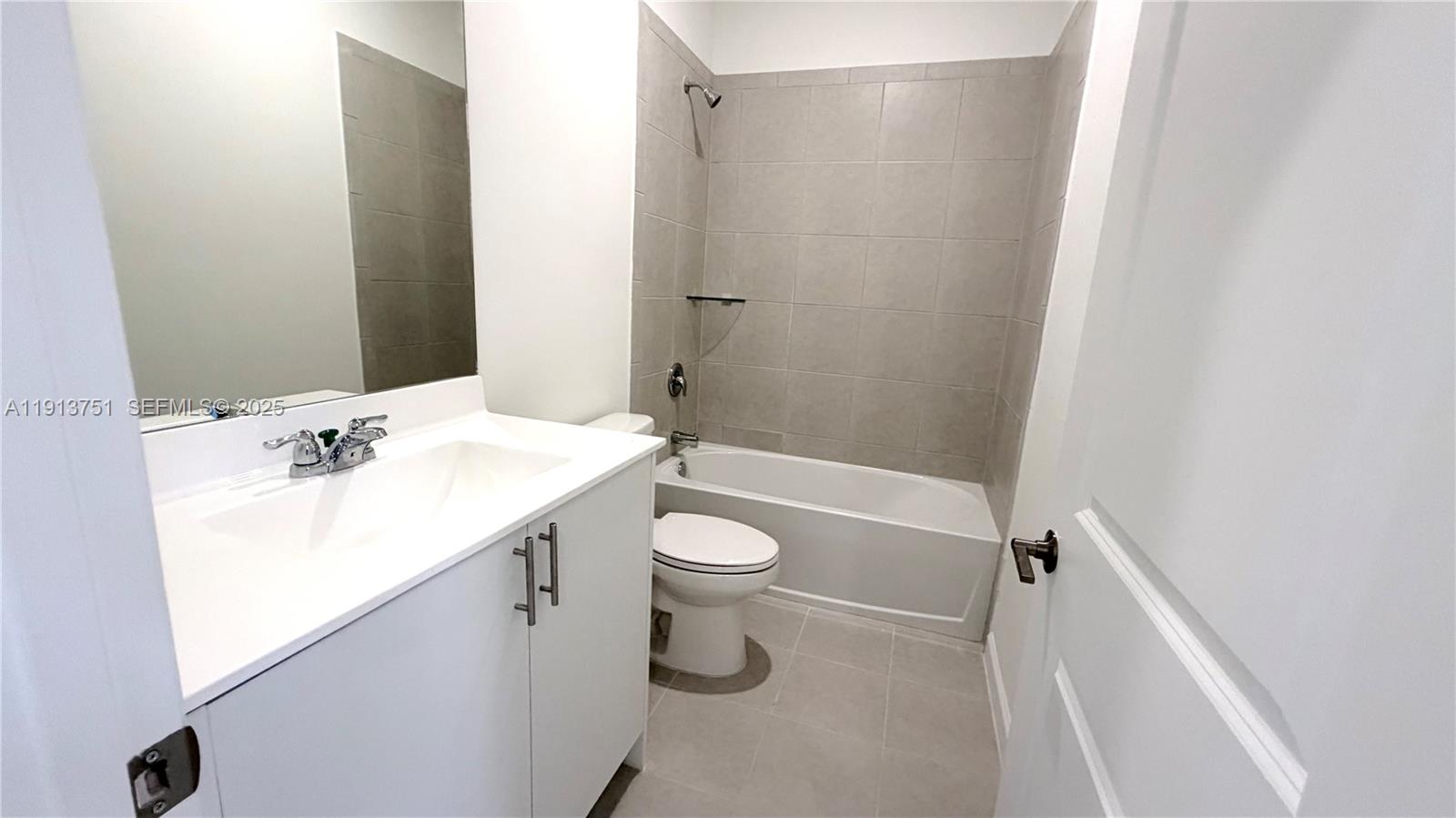 23250 Southwest 133rd Court Homestead, FL 33032 - Photo 21 of 31 a bathroom with a sink a toilet and shower